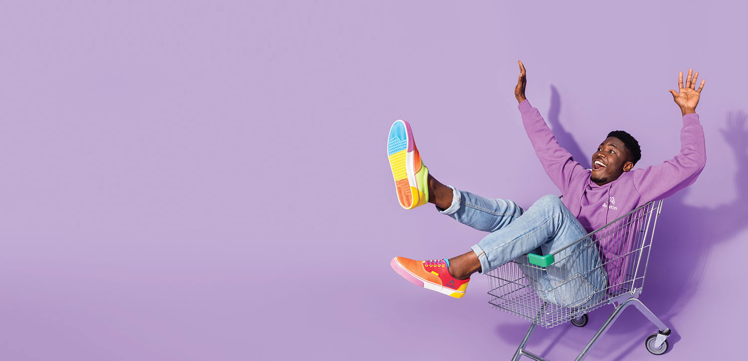 man in shopping cart