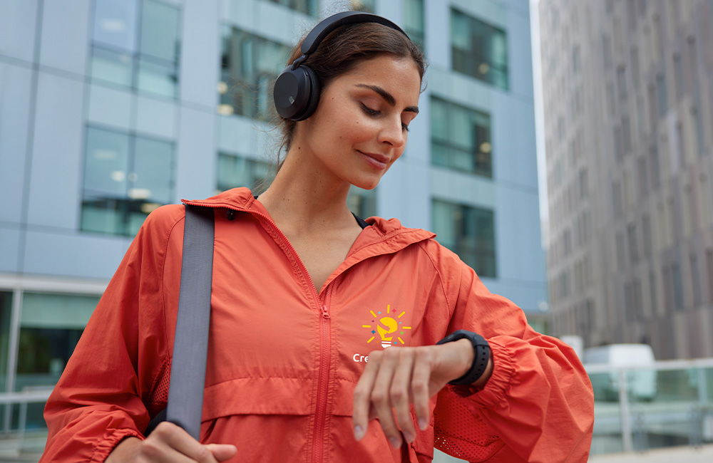 woman wearing an orange jacket