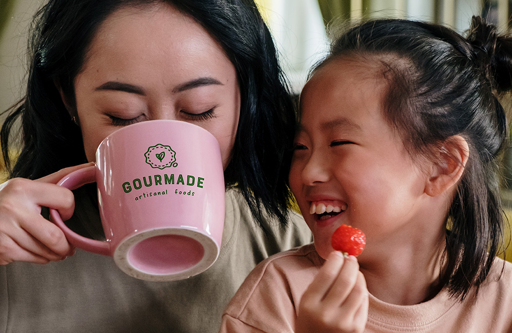 one woman drinking from a mug